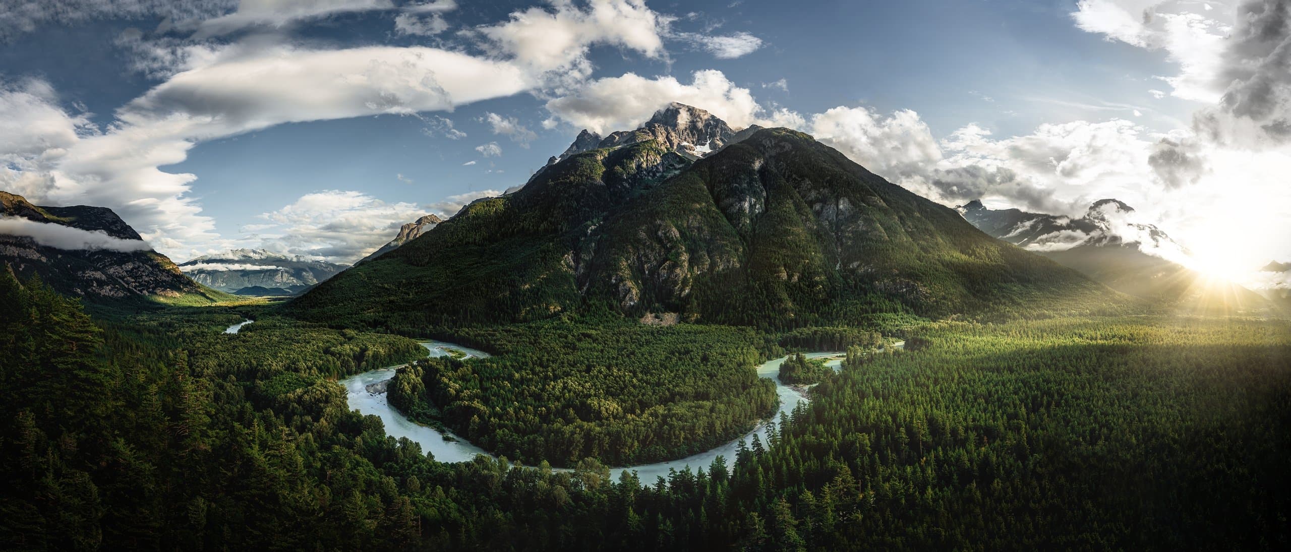 mountain beside a river