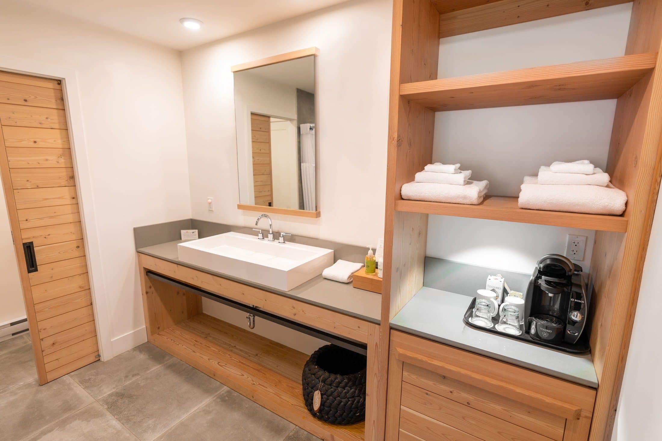 Bathroom with large sink and coffee station