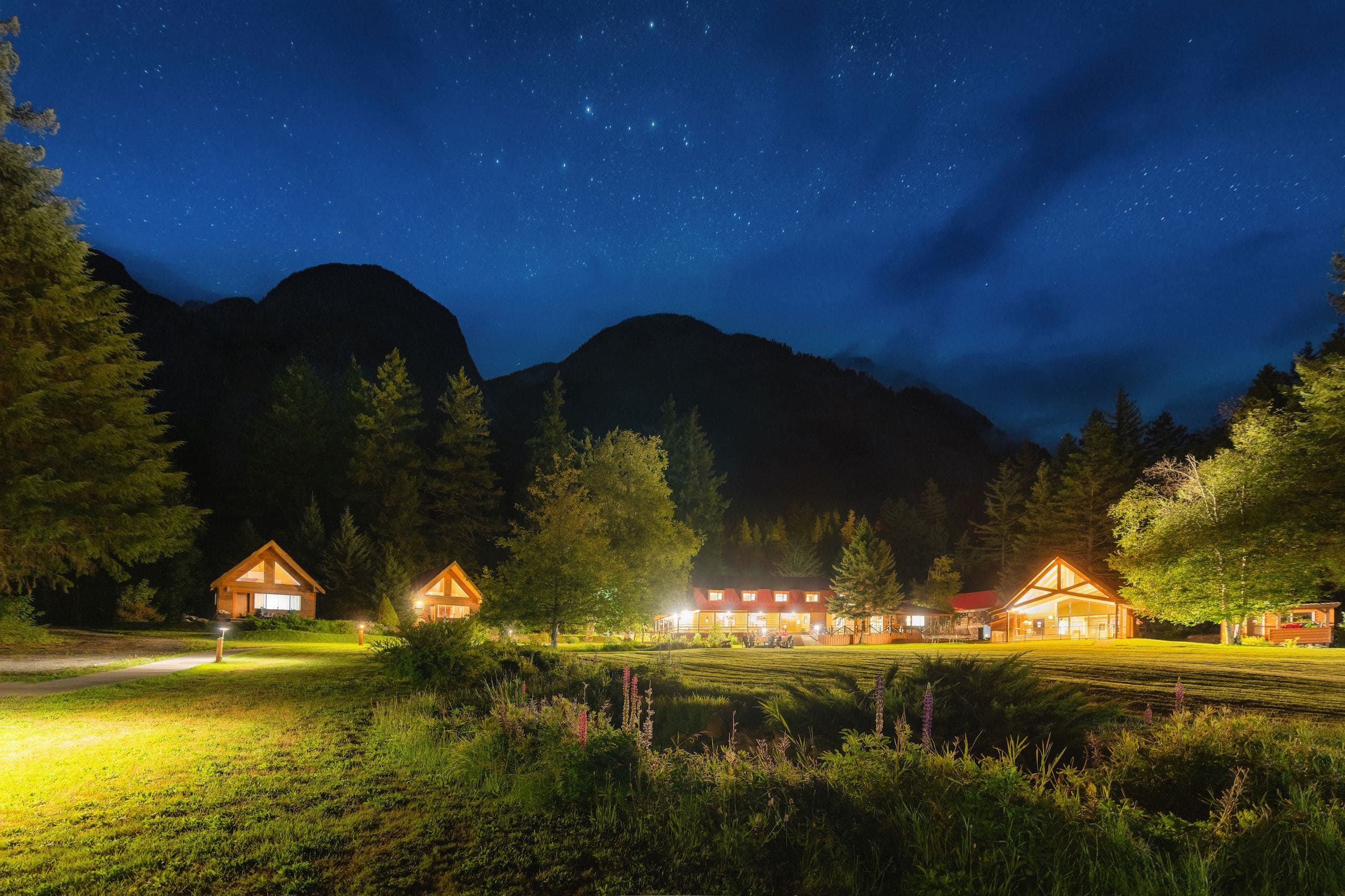 Tweedsmuir Park Lodge lit up at night
