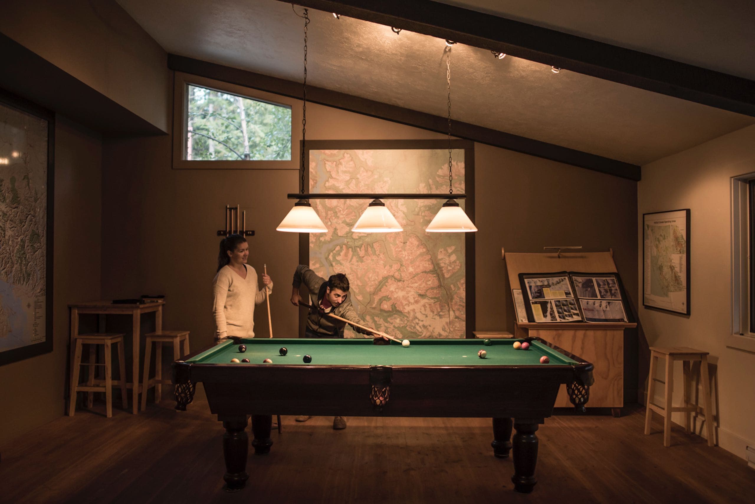 A couple playing pool