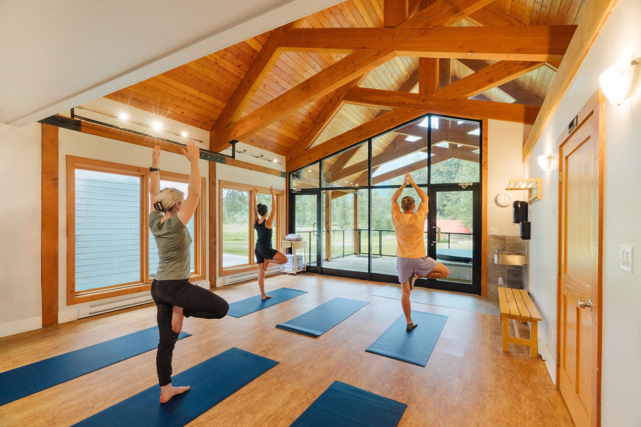 People doing yoga indoors