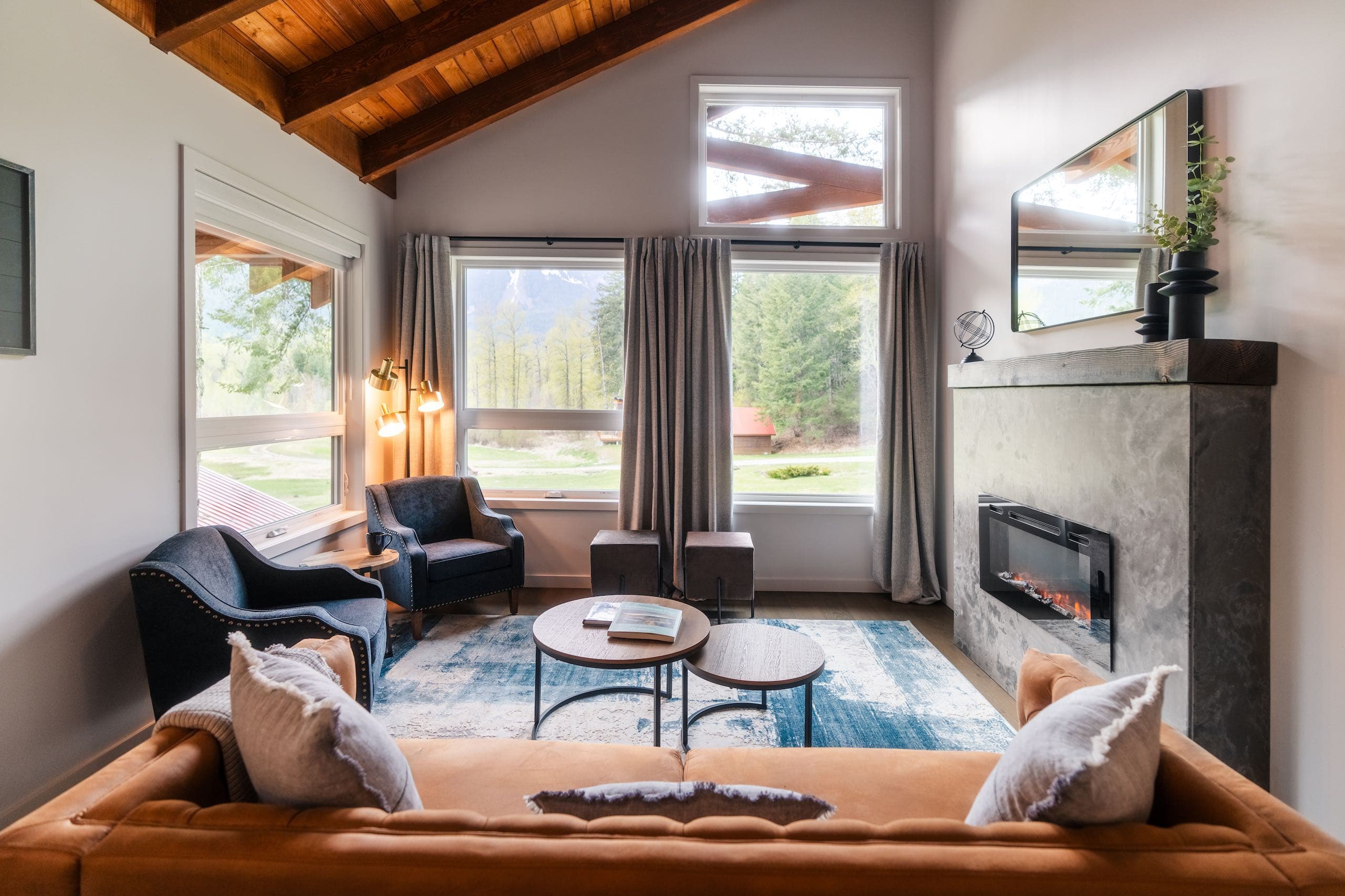 Seating area with large windows and fireplace