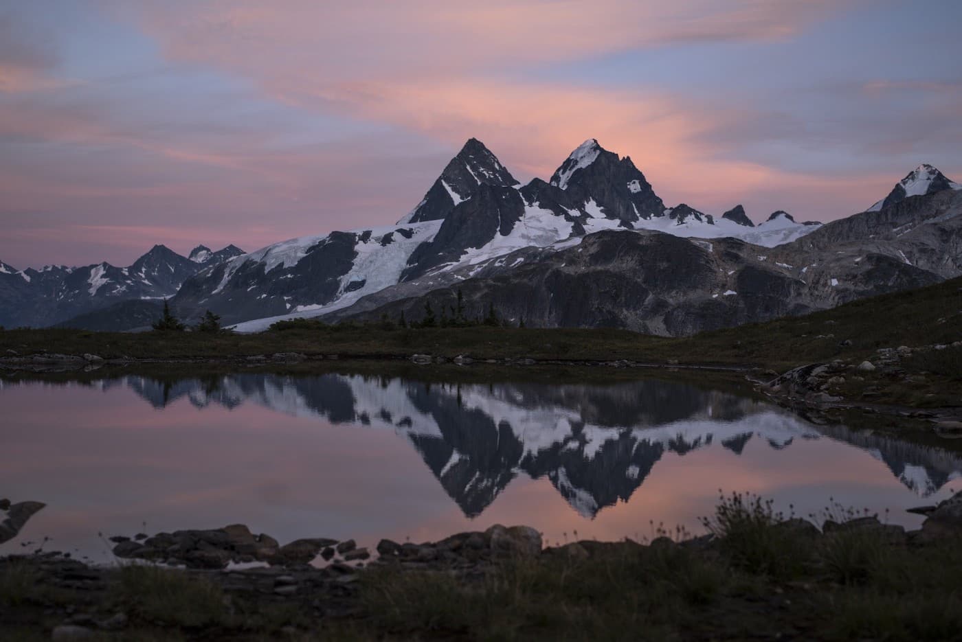 A mountain range at night