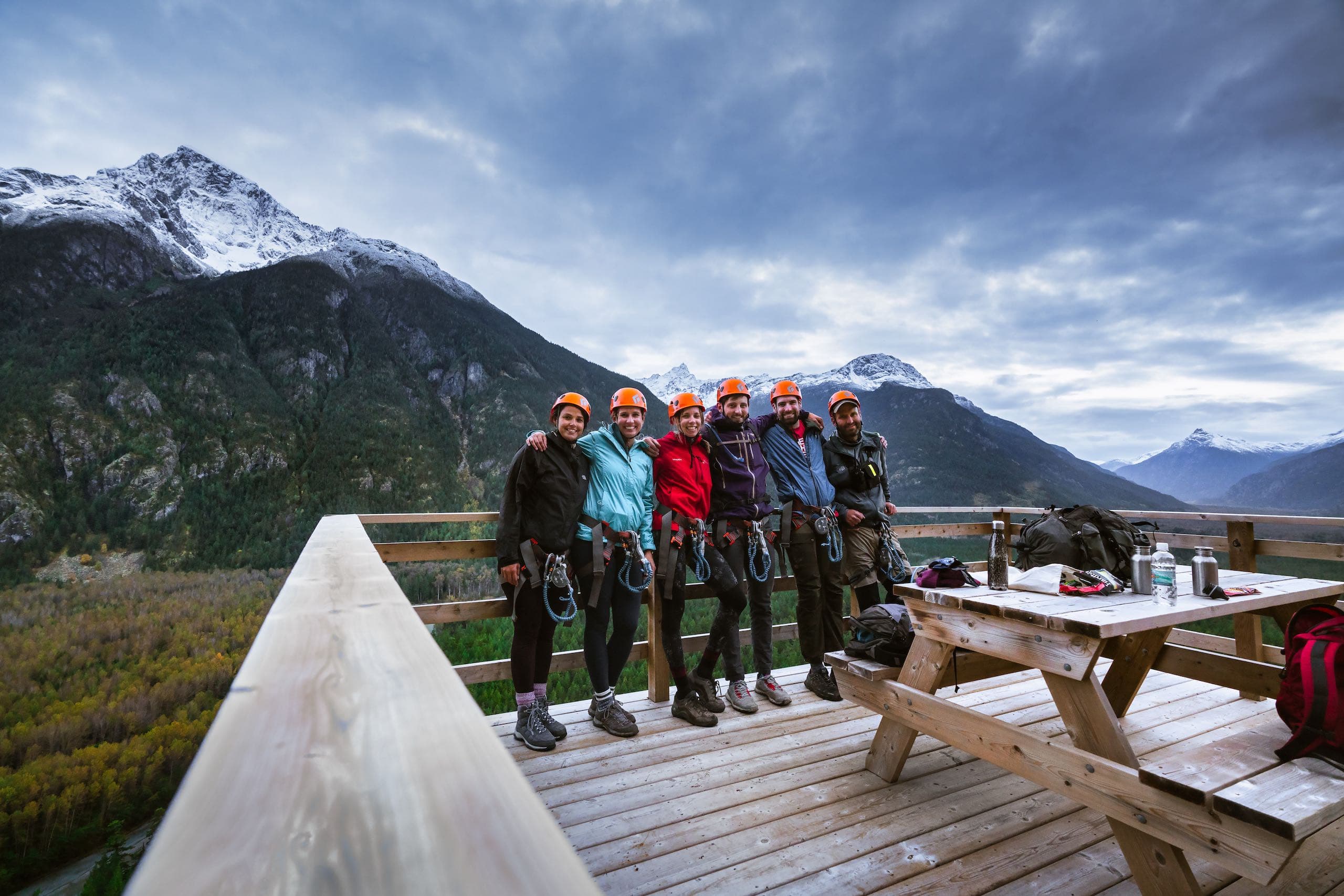 A group of friends posing on a balcony